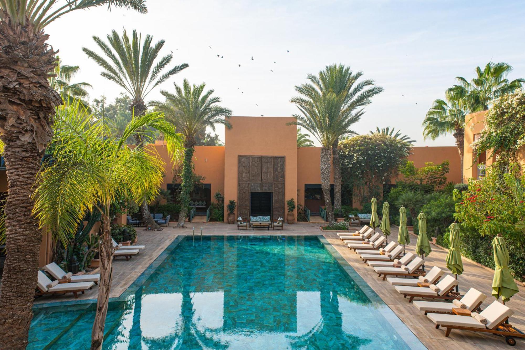 Tikida Golf Palace Агадир Экстерьер фото The swimming pool at the Ouarzazate hotel